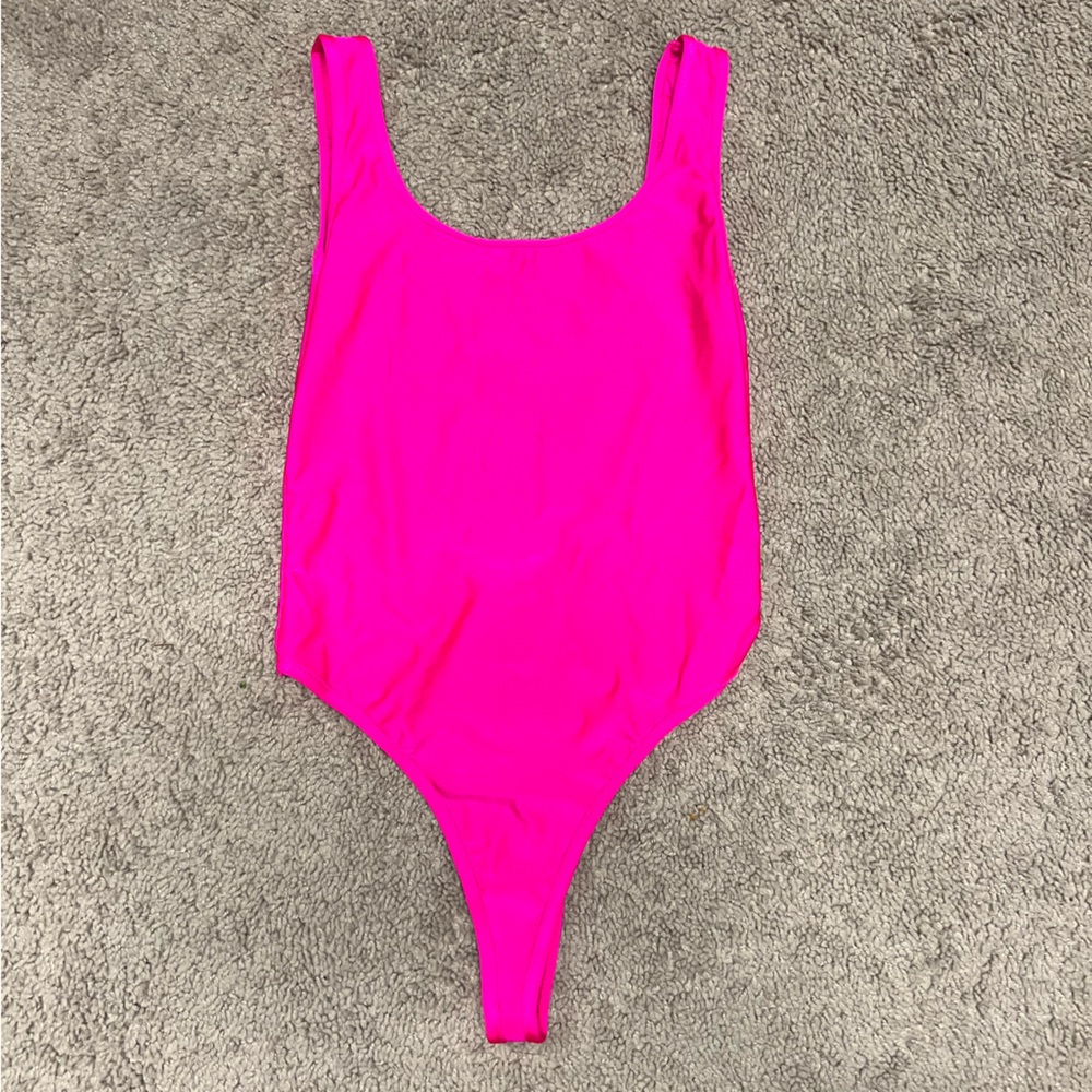 Hot pink body suit